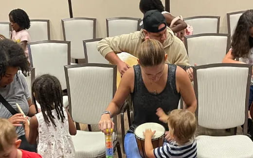 a group of people sitting in chairs
