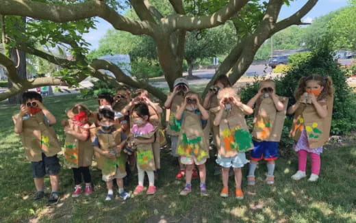 a group of children wearing clothing