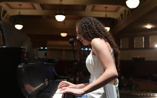 a person playing a piano