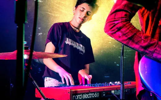 a man playing a keyboard