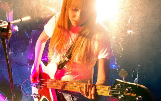 a person playing a guitar