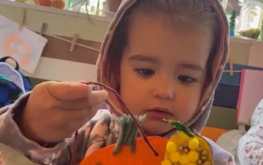 a child eating a fruit