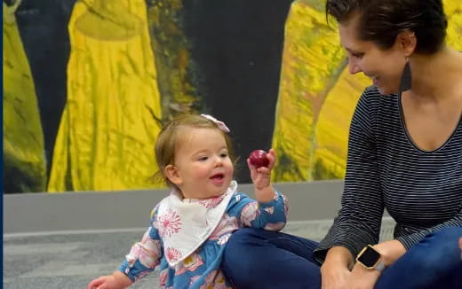 a person holding a baby