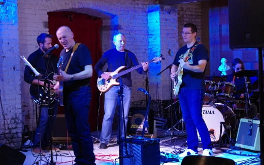 a group of men playing instruments