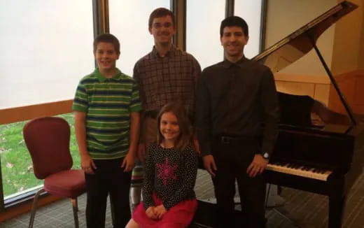 a group of people posing for a photo