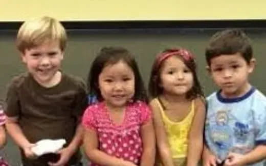 a group of children posing for a photo