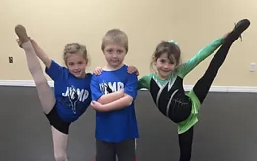 a group of children posing for a photo