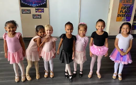 a group of girls posing for a photo