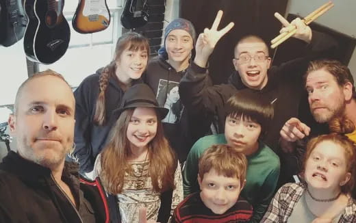 a group of people posing for a photo