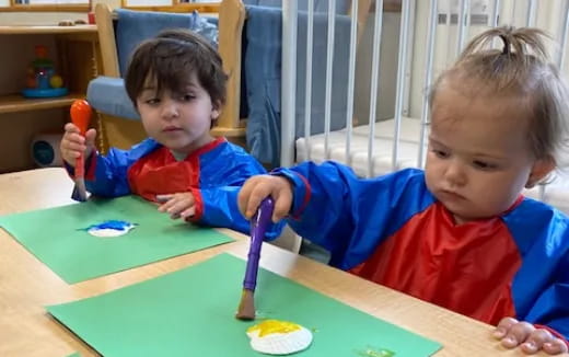 a couple of kids playing with toys