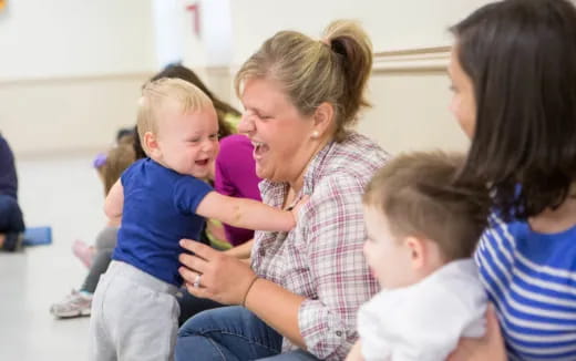 a person holding a baby