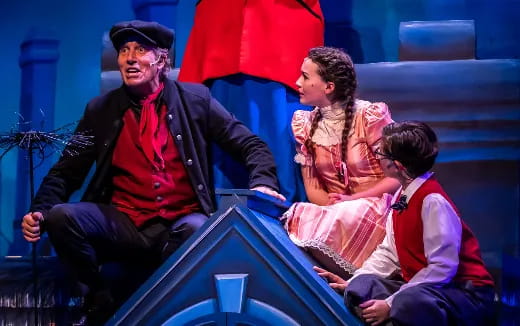 a man and a woman on a stage