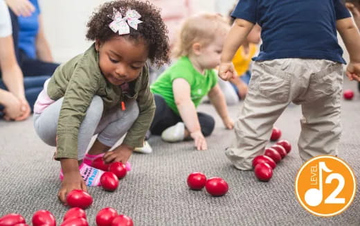a group of children playing with balls