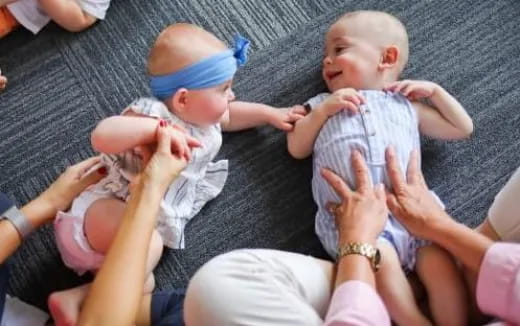 a person holding a baby