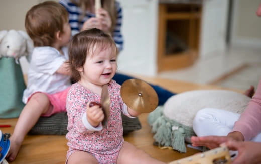 a group of children playing with toys