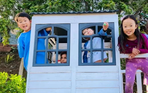 children in a blue house