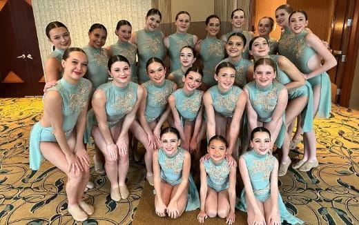 a group of people posing for a photo