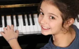a child playing a piano