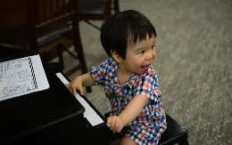 a child playing a piano