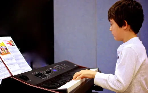 a person playing a piano