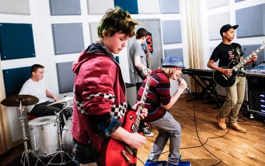 a group of people playing instruments