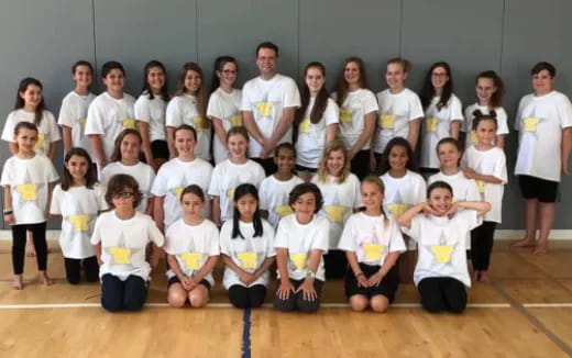 a group of children posing for a photo