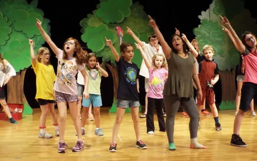 a group of children dancing