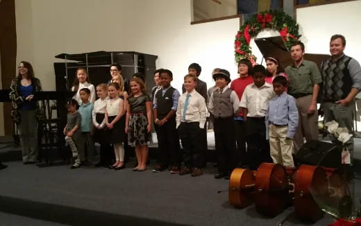 a group of people posing for a photo
