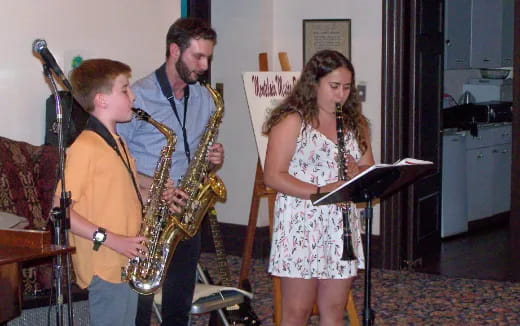 a group of people playing instruments