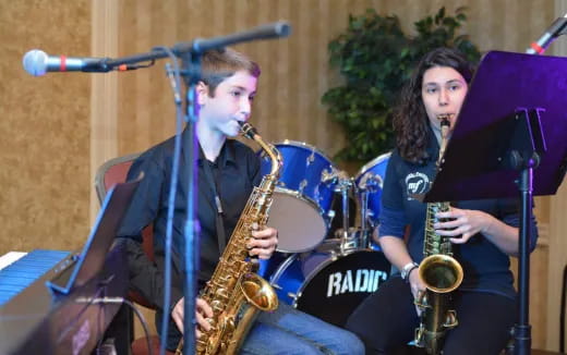 a group of people playing instruments