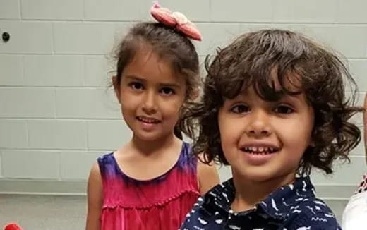 a couple of girls smiling