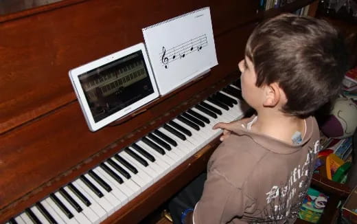 a child playing a piano