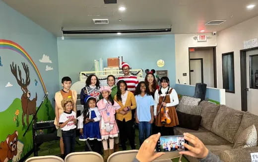 a group of people posing for a photo