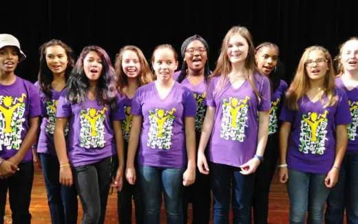 a group of people wearing matching t-shirts