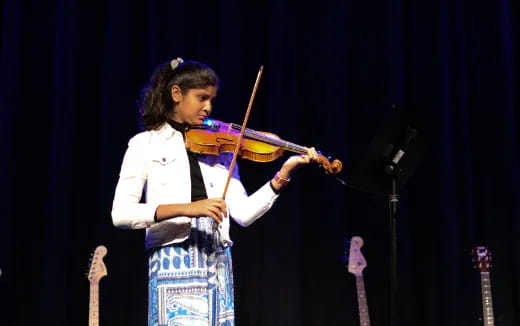 a person playing a violin