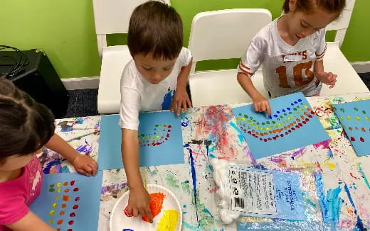 children playing with a puzzle