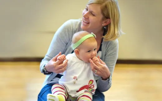 a person holding a baby