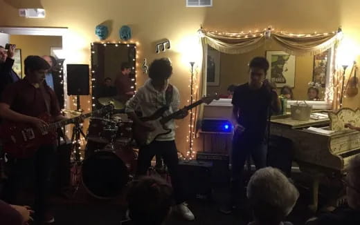 a group of people playing instruments