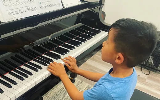 a child playing a piano