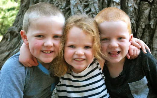 a group of children smiling