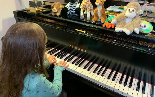 a child playing a piano