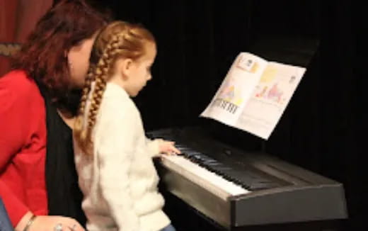 a person playing a piano