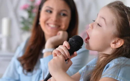 a woman holding a baby