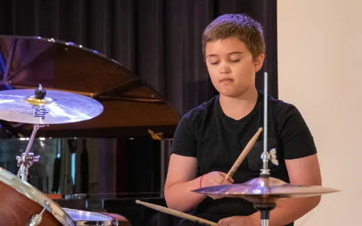 a person playing drums