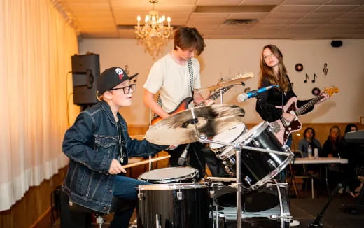 a group of people playing instruments