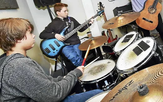 a group of people playing instruments