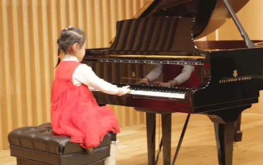 a person playing a piano