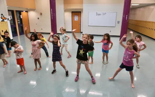 a group of children dancing