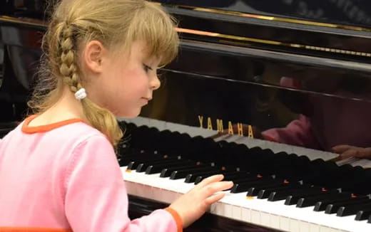 a person playing a piano