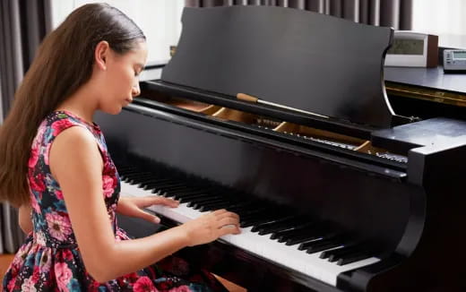 a person playing a piano